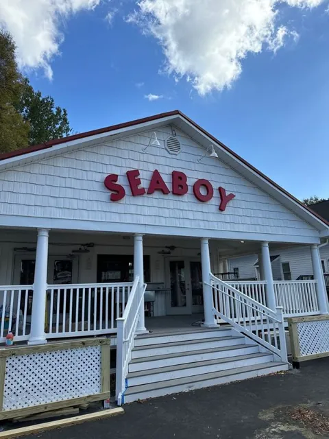 Dimensional business lettering mounted above a storefront entrance